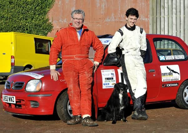 Father and son...Drew and Andy Struthers are pictured with Andys Nissan Micra rally car and their pet collie Molly (Pic Lindsay Addison)