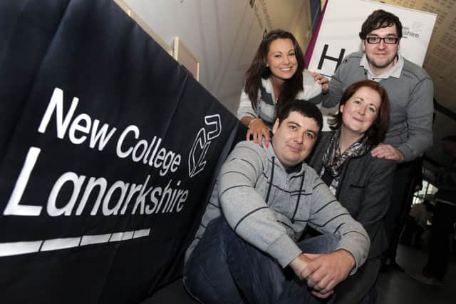 Students who worked on the new logo are pictured.