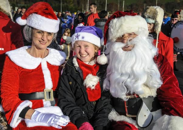 Merry Christmas...for Amy Carmichael with Santa and Mrs Claus at Dobbies Sandyholm Grotto opening (Pic Andrew Wilson)