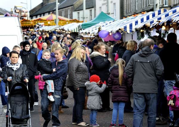 Christmas shopping...at Lanark's annual Christmas Market in the town's High Street (Pic Lindsay Addison)