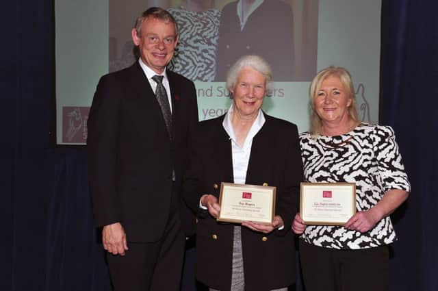 Martin Clunes presenting Liz Nairn (far right) with 30-year long service award at British Horse Society annual awards.