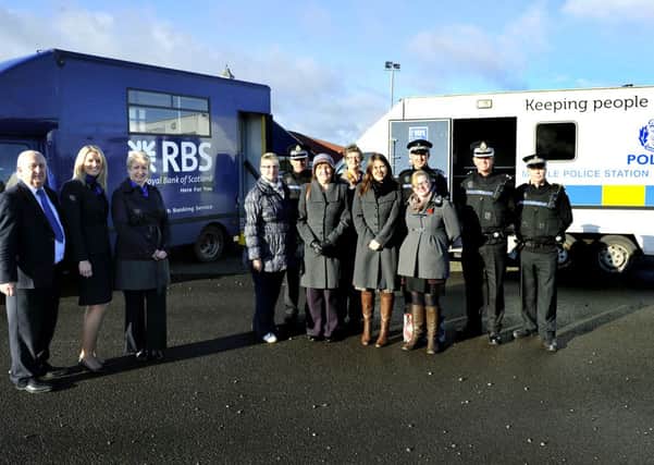 Banking on police...anti-fraud initiative is launched at Lanark Market