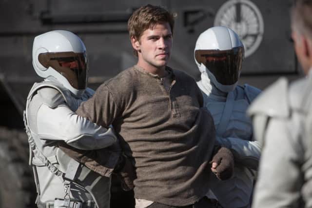 Undated Film Still Handout from The Hunger Games: Catching Fire. Pictured: Liam Hemsworth. See PA Feature FILM Film Reviews . Picture credit should read: PA Photo/Lionsgate Publicity. WARNING: This picture must only be used to accompany PA Feature FILM Film Reviews.
