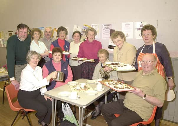 COFFEE TIME: Members of Kilsyth Burns and Old Parish Church with lots of tasty goodies at a coffee morning in 2003.