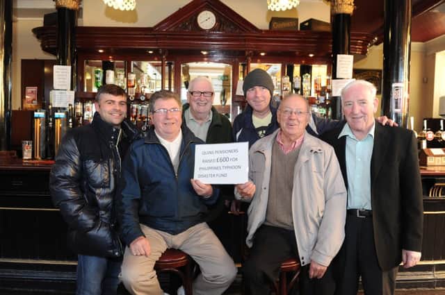 Photograph Jamie Forbes 22.11.13 BISHOPBRIGGS. Quin's Bar. Pensioners raised £600 for Philippines appeal during a Christmas lunch organised by the pub. L/R Warren Culbert, Jimmy Rodden, John Brannigan, Sammy Stewart, Billy Ferns, Billy Connolly.