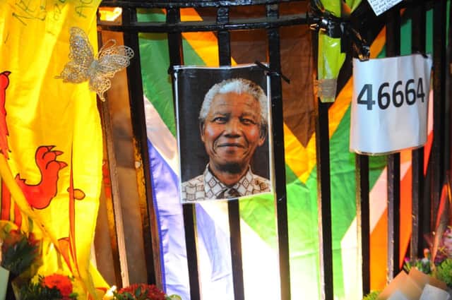 A vigil for Nelson Mandela in Nelson Mandela Square in Glasgow