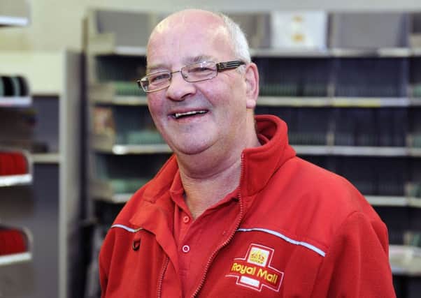 Photo: John Devlin. 09/12/13. KILSYTH  -  Donald Provan. Long-serving postman for Banknock and Queenzieburn, celebrating 40th anniversary of employment. NJM