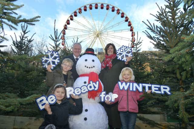 Cabinet secretary for health and wellbeing Alex Neil joins associate medical director Dr Laura Ryan and Scottish schoolchildren to launch the NHS Be Ready for Winter campaign. Photo by Jon Savage.