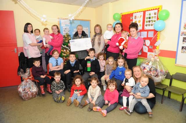 Riverside Childcare with £3,500 cheque.