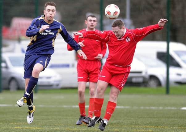 UP FOR IT: Action from 1FC Abronhill's match against Forth Thistle on Saturday.