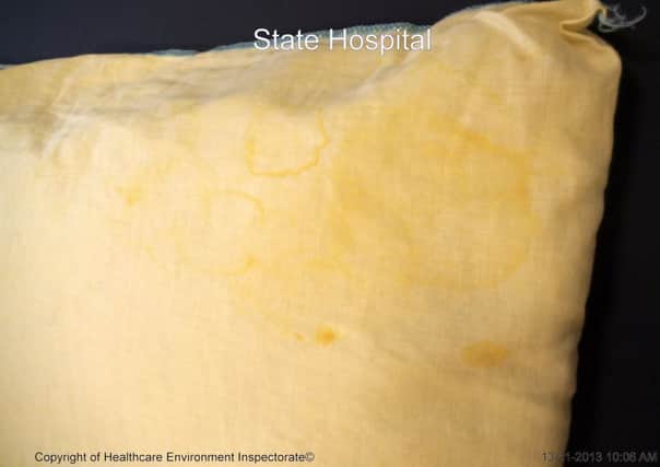 Stained pillow...to welcome new patient to State Hospital