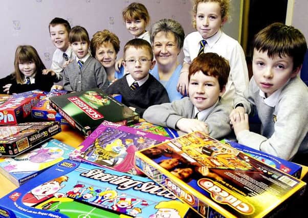 Still game...Crawforddyke children with the games they were giving to Wishaw Hospital