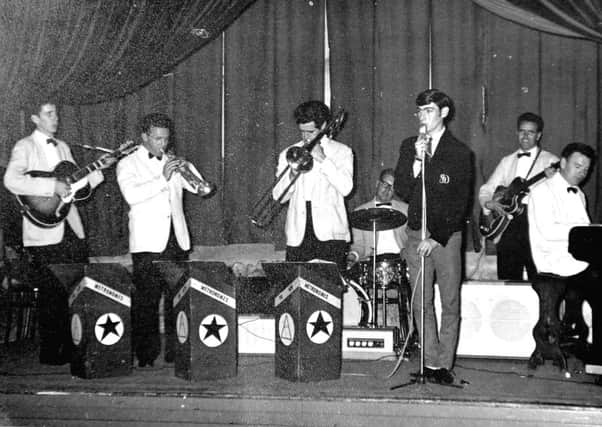 LIVE SOUND: The Metronomes, a band popular throughout the Cumbernauld and Kilsyth area, are pictured in the early 1960s. The line-up was Hugh McCann (guitar), James Rafferty (trumpet), Archie Cranie (trombone), Robert Millar (drums), Pat Rafferty (bass guitar), Eddie Coleman (piano) and Jim Doherty (vocalist), who contributed this picture