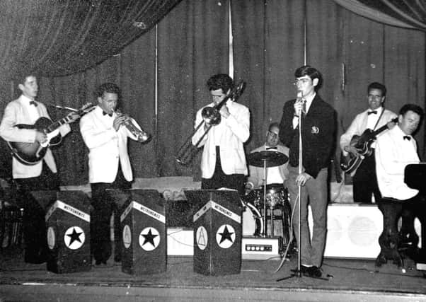 LIVE SOUND: The Metronomes, a band popular throughout the Cumbernauld and Kilsyth area, are pictured in the early 1960s. The line-up was Hugh McCann (guitar), James Rafferty (trumpet), Archie Cranie (trombone), Robert Millar (drums), Pat Rafferty (bass guitar), Eddie Coleman (piano) and Jim Doherty (vocalist), who contributed this picture.