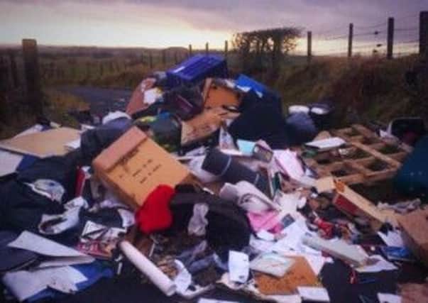 East Ren roads are blighted by fly tipping, in some cases by rogue traders