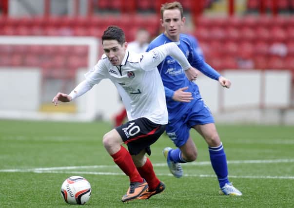 ACTION MAN: Clyde's Stefan McCluskey gets away from his marker during Saturday's match at Broadwood.