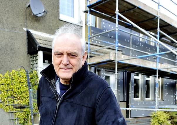 Scaffolding is up...but Malcolm Jamieson (66), of Couthally Gardens, Carnwath, is unsure if work will now be carried out at his home (Pic Lindsay Addison)