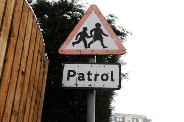 Community police officers are encouraging drivers on the school run to be aware of the children around them.