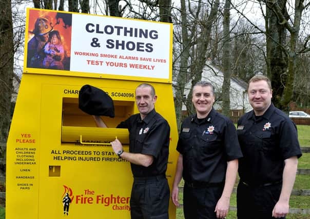 At clothes point...Andy Stevenson (fire fighter), Alistair Stewart (watch manager) and Gary Tudhope (fire fighter)
