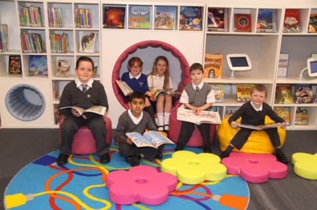Braidbar Primary pupils check out the childrens area. Front: Joshua McDonald P5; Umair Inwar P2; Oliver Baird P2; Alex Duff P1. Back: Sophie Ward P5; Erynn Knight P5.