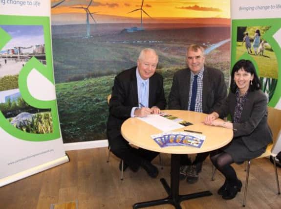 The Concordat is signed at Whitelee Windfarm.