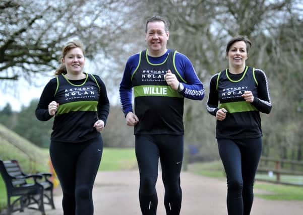 Marathon training....Eilidh McCulloch, her dad Willie  and friend and colleague Wendy Kerr (Pic by Lindsay Addison)