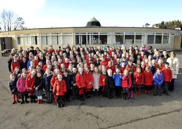 In the round...pupils at Braidwood Primary School waved a fond farewell to their old "futuristic" school building with a Mexican wave (Pic Lindsay Addison)