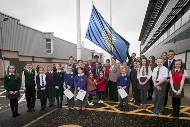 KIRKINTILLOCH Council HQ - 
 Commonwealth Flag: Dignatories, School pupils  raising the flag the flag 
10th March 2014
Pic: Roberto Cavieres