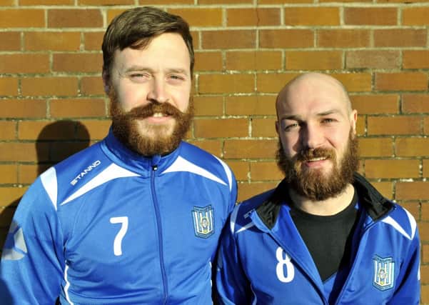 Winners...
Craig Stewart and Stephen Clark - who are growing beards for charity -  helped 
Carluke Baptist Football Club through to next round.