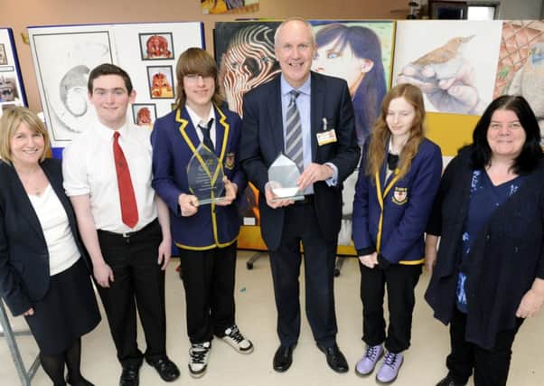 Greenfaulds head teacher John May, centre, was delighted to congratulate the award-winning pupils and their teachers.