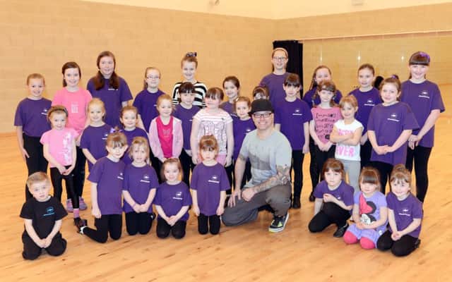 Tim Noble with youngsters at Dance Phase.