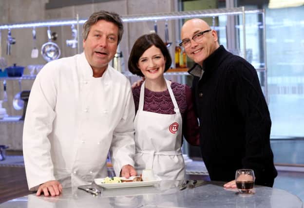 Judges John Torode and Gregg Wallace posing with journalist Jeananne Craig.