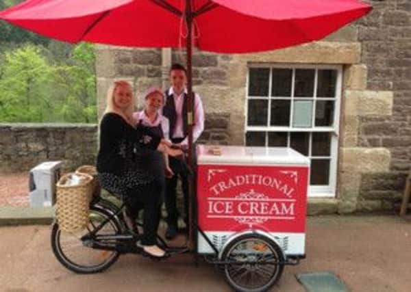 Full cycle...New Lanark Trust team with old-fashioned ice cream cart (Contributed pic)