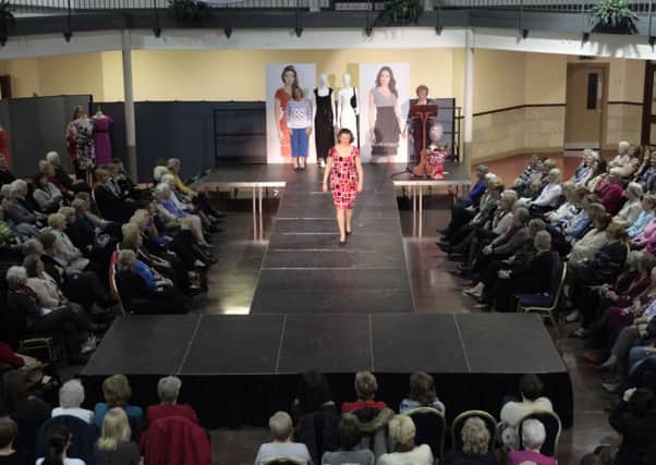 Remember, Smize... Doing a Tyra Banks on the catwalk at Lanark Agricultural Centre, the female and male models drew in a large crowd (Pic Helen Barrington)
