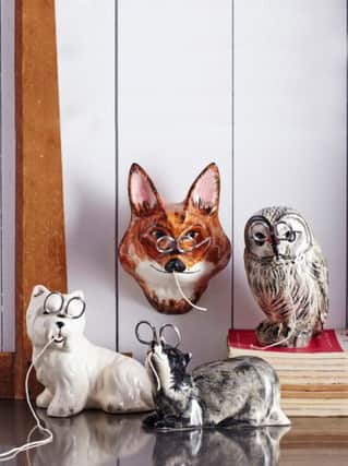 Animal string and scissor holders,  feature a badger, owl, Westie dog, or fox.