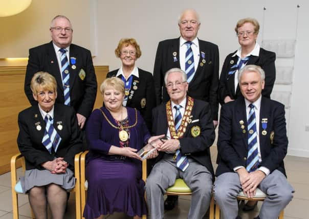 Steeling a march...Carluke BC president Bert Steele and other members with Provost Logan