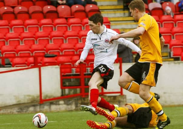 Clyde's Stef McCluskey in the thick of the action during Saturday's match against Annan Athletic.