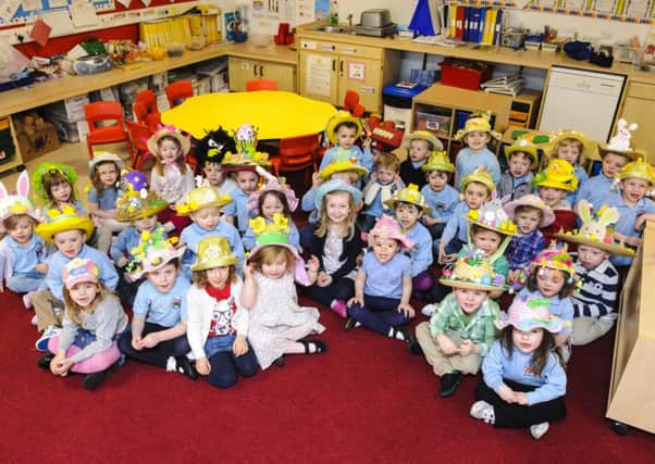 Good eggs...Pupils from St Athanasius PS nursery class in Carluke entertained parents with an Easter Bonnet Parade (Pic Andrew Wilson)