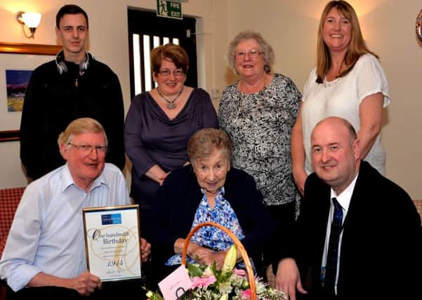 Celebrating...Annie Graham, aged 100, with her family around her (Pic Rodger Price)