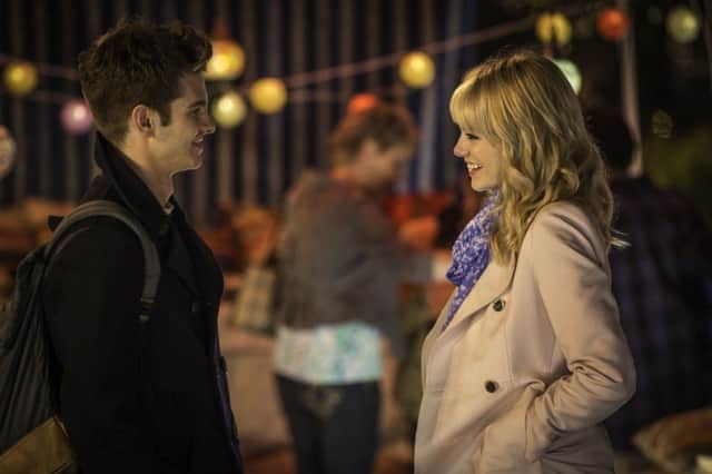 Andrew Garfield as Peter Parker (Spider-Man) and Emma stone as Gwen Stacy.
