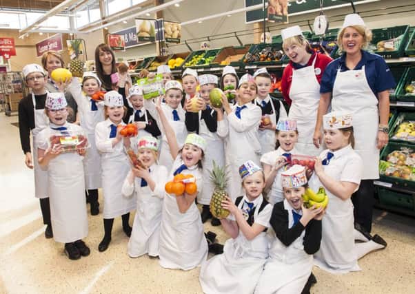 Every Little Helps...High Mill Primary School pupils certainly learned more than a little during a visit to Tesco in Carluke (Pic Lenny Warren)