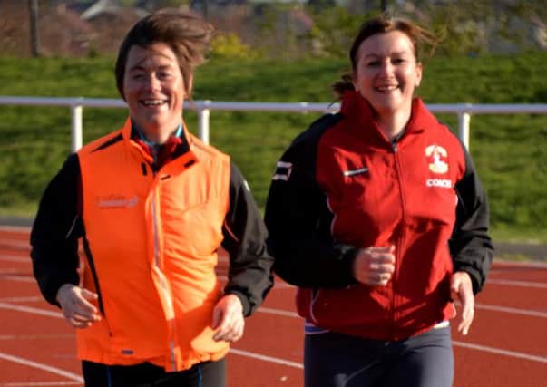 Game on...for Law and District AAC members Sharon Biggin (left) and Siobhan Lindsay, who have been picked to carry the Queen's Baton in the Commonwealth relay for Glasgow's Games 2014 (Pic Rodger Price)