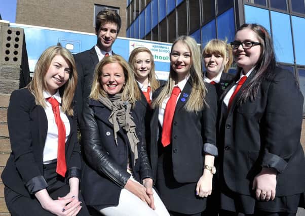 17-04-2014. Picture Michael Gillen. CUMBERNAULD. Abronhill High School: BBC's The One Show filming Gregory's Girl inspired episode at the school with Clare Grogan. Shannon O'Connor 17, Scott Parker 17, Clare Grogan, Vanessa Juba 17, Emma Hamilton 17, Ivory Bennett 16 and Chanice Young 16.