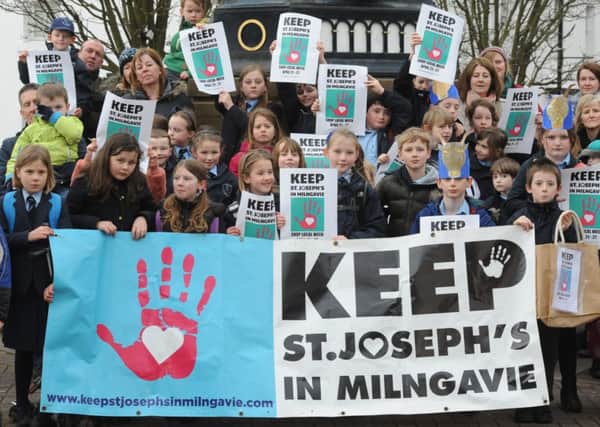 Photograph Jamie Forbes 28.3.14 MILNGAVIE precinct, parents from St Joseph's Primary School launch 'Shop Local' as part of campaign to save the school.