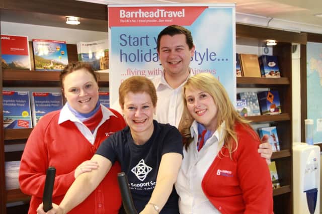 Gillian Irvine (centre) with Barrhead Travels sporting heroes Amy Body, Scott McGee and Elisabeth Mitchell