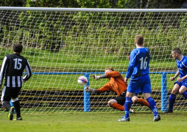 Disaster strikes...it all goes wrong for Lanark as they concede a last minute goal in their Central Division 1 match at Moor Park on Saturday (Pic Andrew Wilson)
