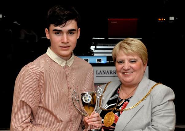 James McLafferty received Clydesdale Player of the Year prize from Provost Eileen Logan (Pic Rodger Price)