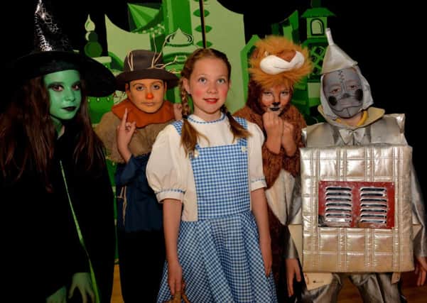 Down the yellow brick road...for Douglas Primary School pupils 2014 Wizard of Oz show (Pic Rodger Price)