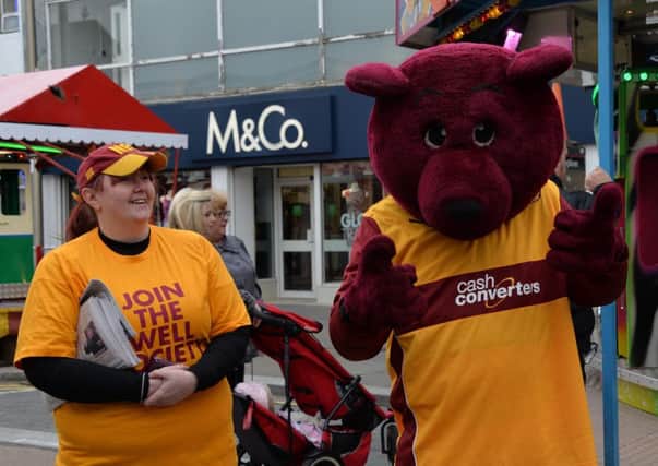 Motherwell mascot Claret tries ot drum up some support during Bellshill Street Fair