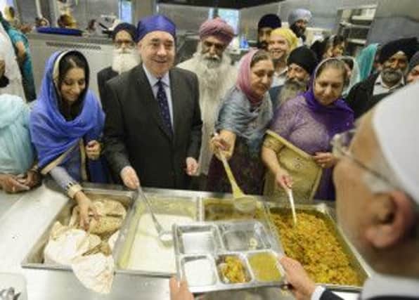 First Minister Alex Salmond meets Glasgow's Sikh community at Glasgow Gurdwara

Pictured serving food